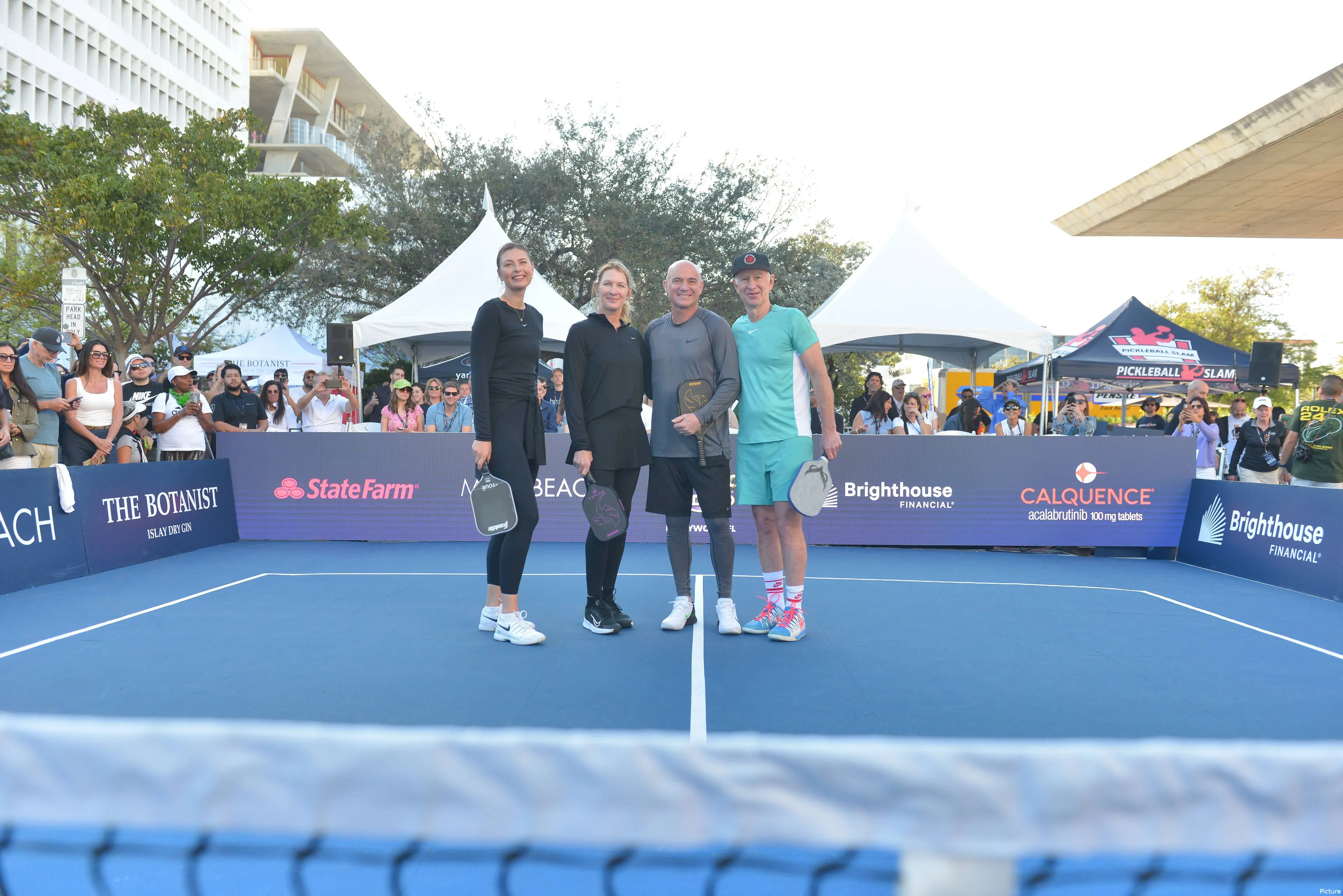Power couple Andre Agassi and Steffi Graf defeat John McEnroe and Maria